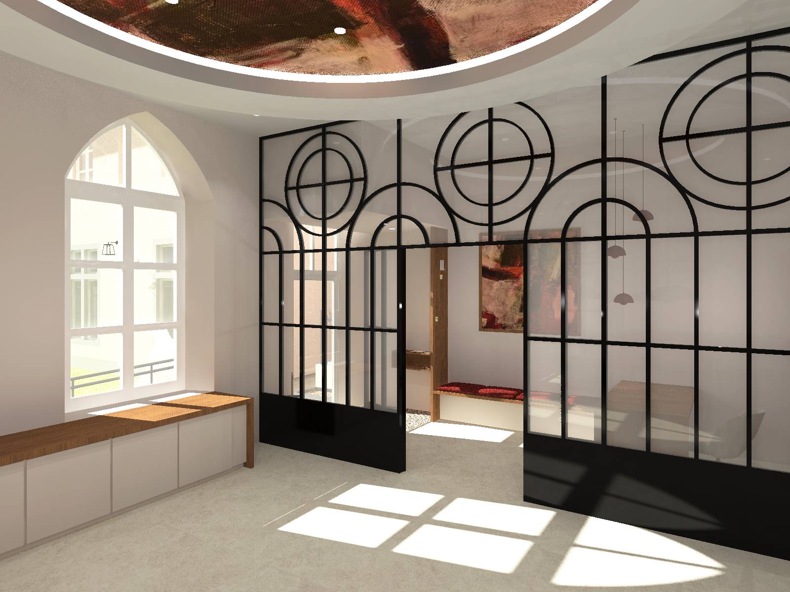 Des grandes verrières en métal rappelant les motifs du cloître